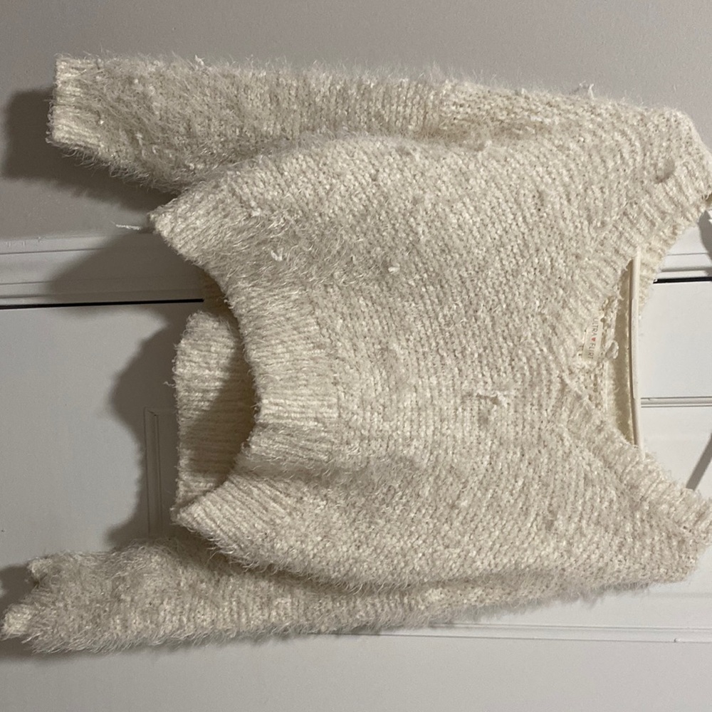 white sweater